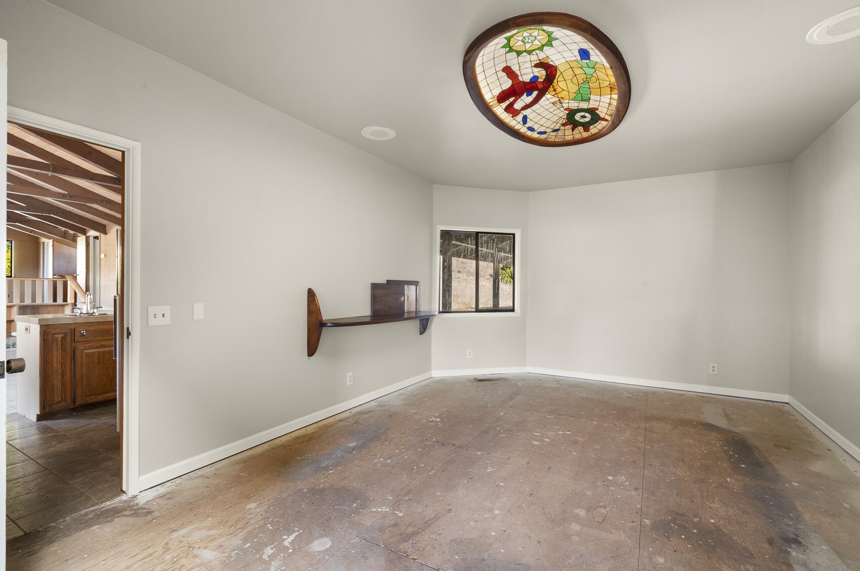 1959 Rambling Oaks Road Santa Ynez, CA 93460 - Photo 23 of 42 an empty room with a window