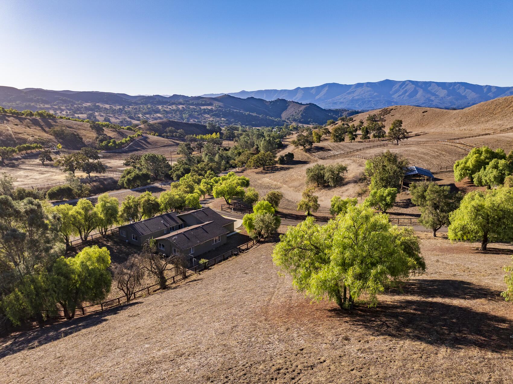 1959 Rambling Oaks Road Santa Ynez, CA 93460 - Photo 28 of 42 a view of a city with mountains in the background