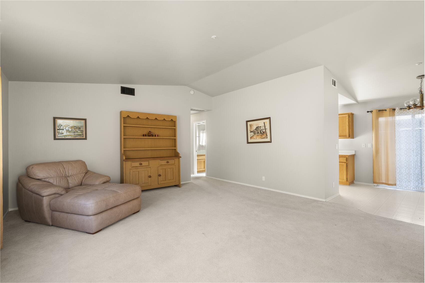 1959 Rambling Oaks Road Santa Ynez, CA 93460 - Photo 32 of 42 a living room with furniture and a window