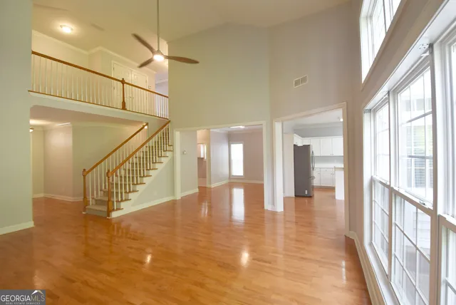 a view interior of a house a floor to ceiling window and entryway