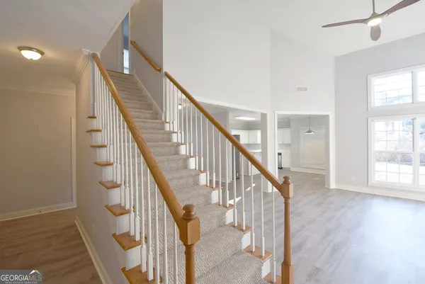 a view of entryway with wooden floor