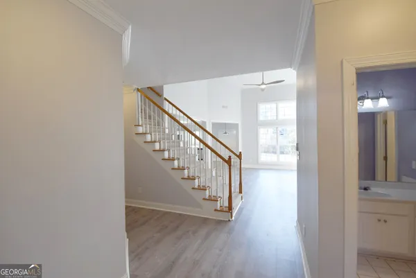 a bathroom with a sink a vanity and a mirror