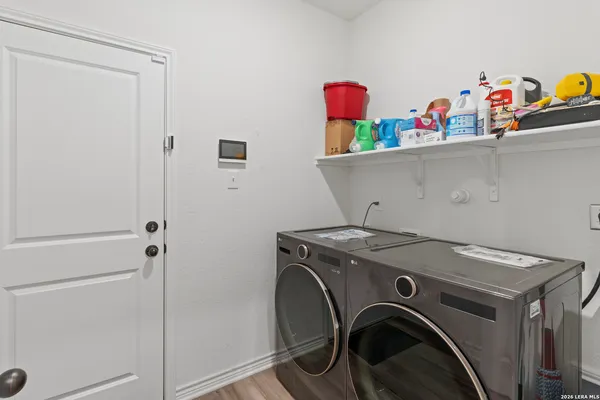 a utility room with dryer and washer