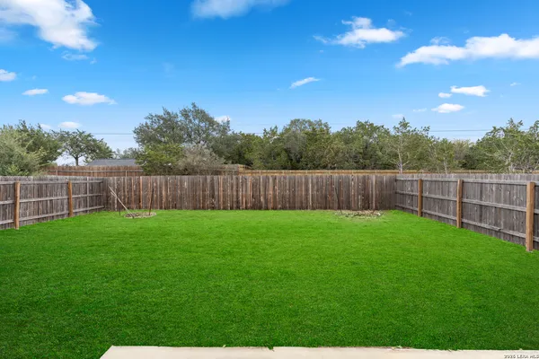 a view of a backyard with a garden