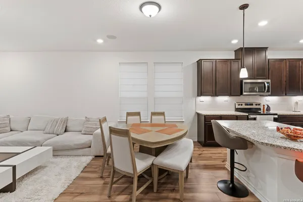 a view of a dining room with furniture
