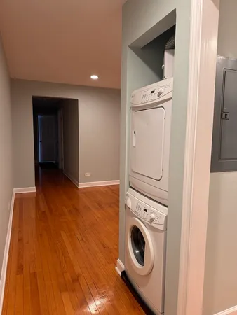 a view of a storage & utility room with washer and dryer