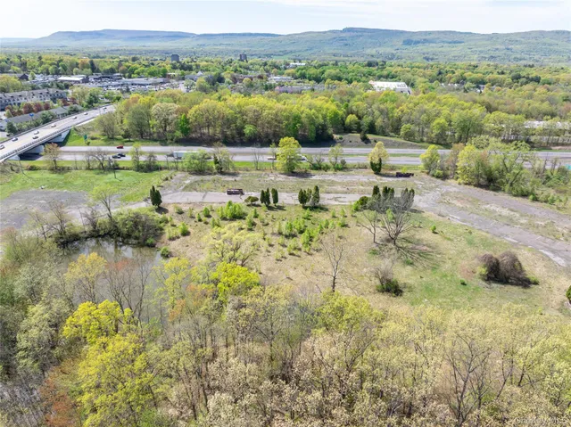 a view of a lake with mountain in the background