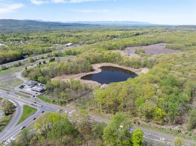 a view of a pathway with a yard