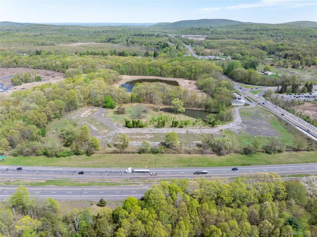 a view of a city from a balcony with outdoor space