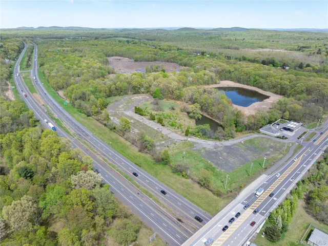 a view of a road with a yard