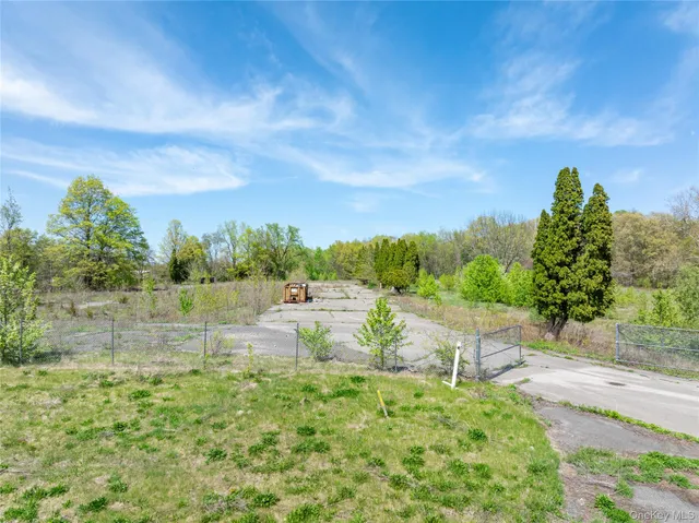 a view of lake with green space
