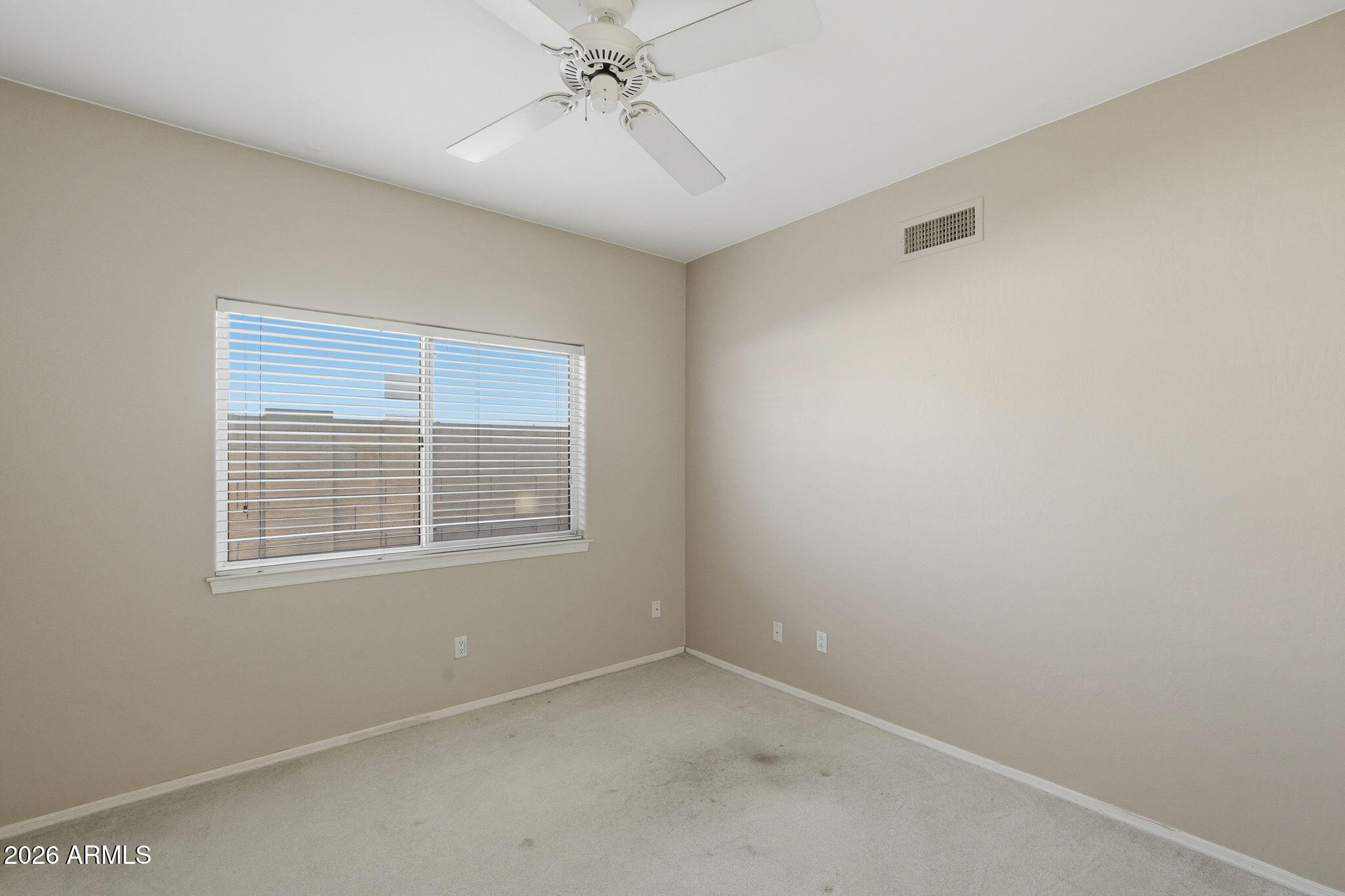 16651 South 18th Way Phoenix, AZ 85048 - Photo 22 of 43 a view of an empty room with a window