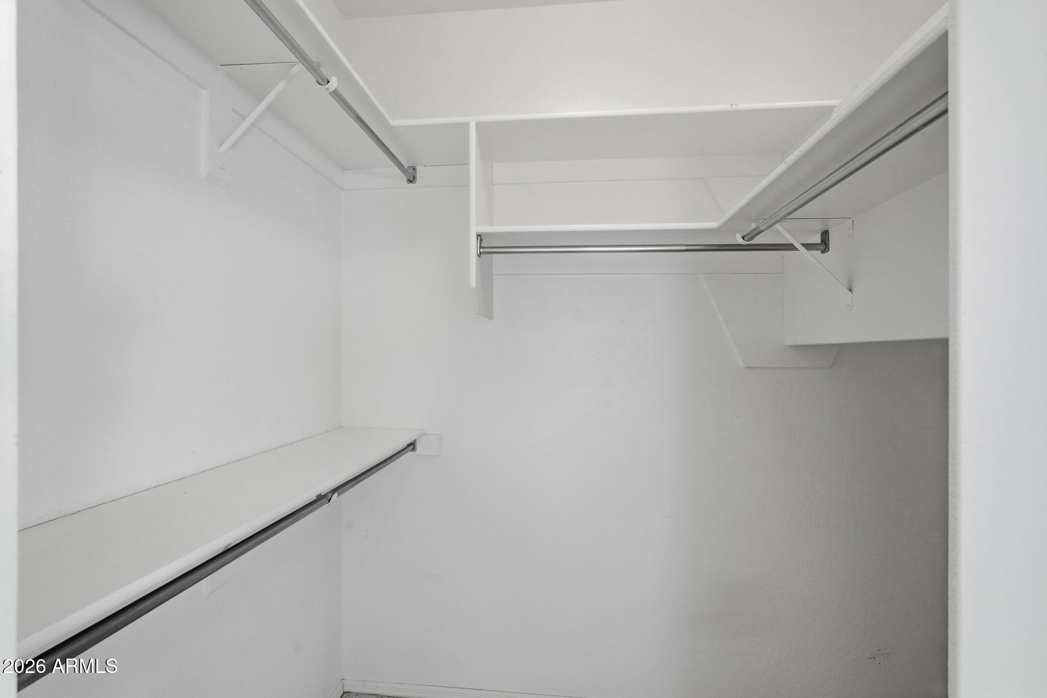 16651 South 18th Way Phoenix, AZ 85048 - Photo 30 of 43 a view of an empty walk in closet