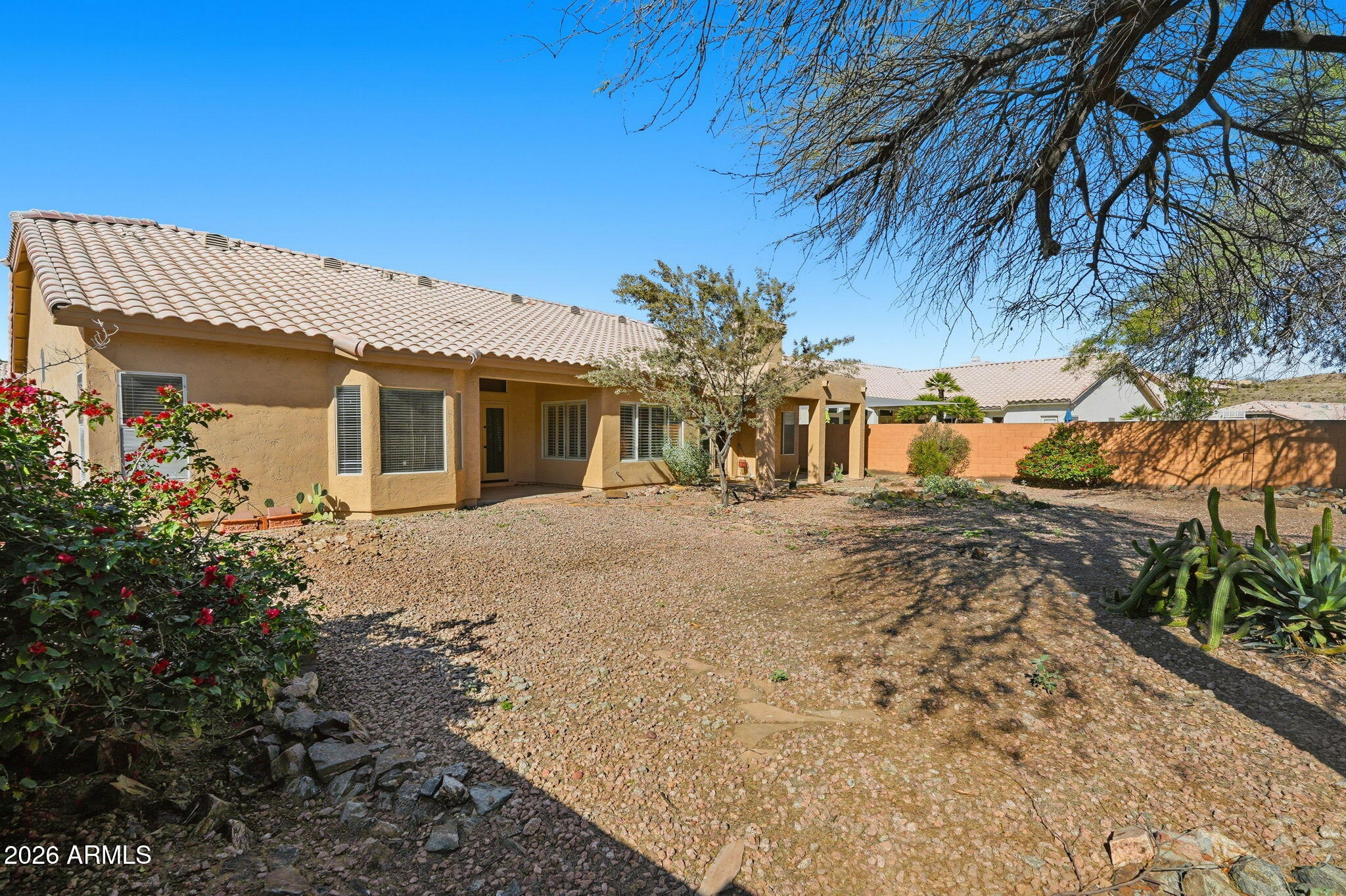 16651 South 18th Way Phoenix, AZ 85048 - Photo 39 of 43 a front view of a house with a yard