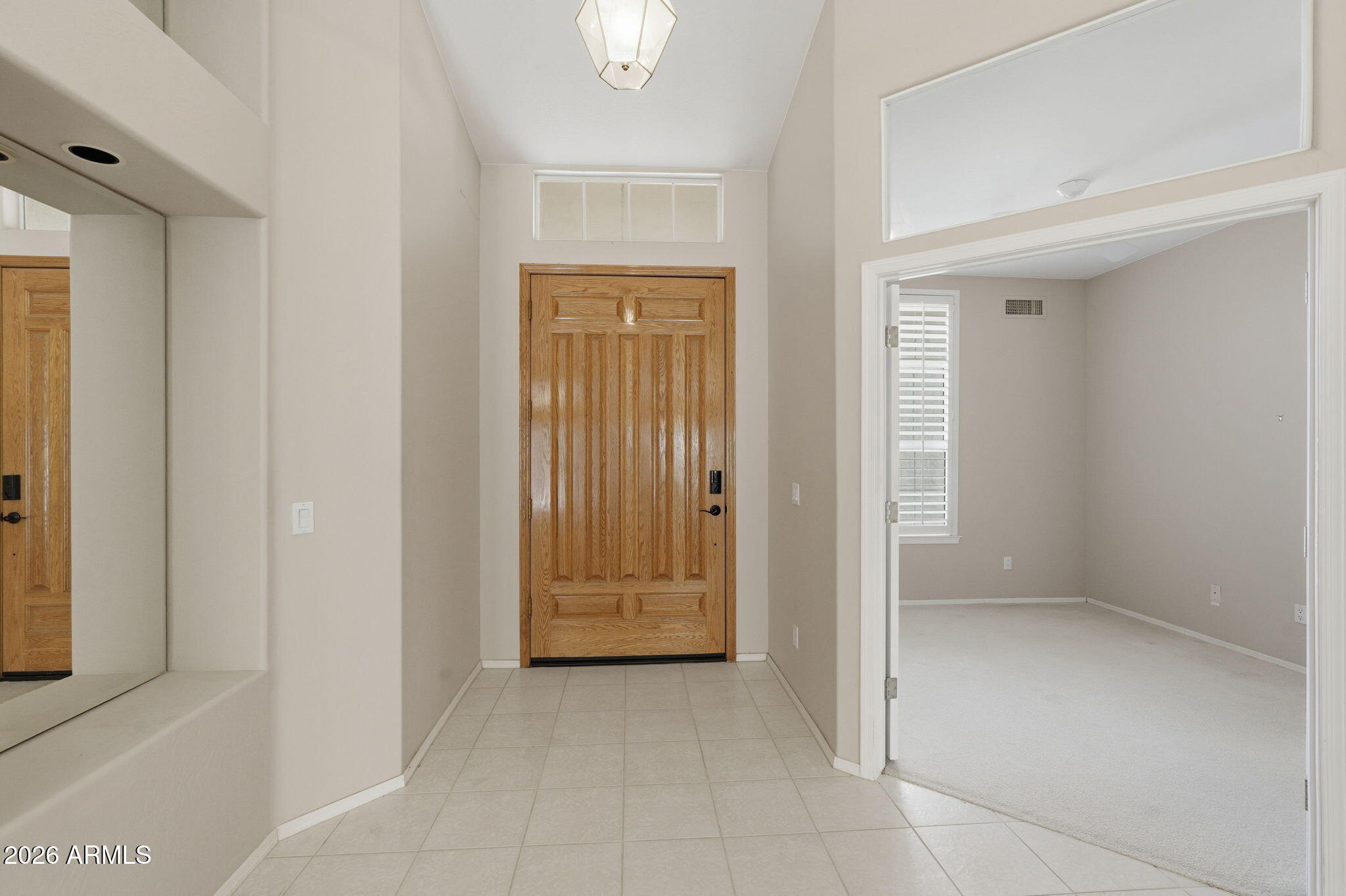 16651 South 18th Way Phoenix, AZ 85048 - Photo 5 of 43 an empty room with windows