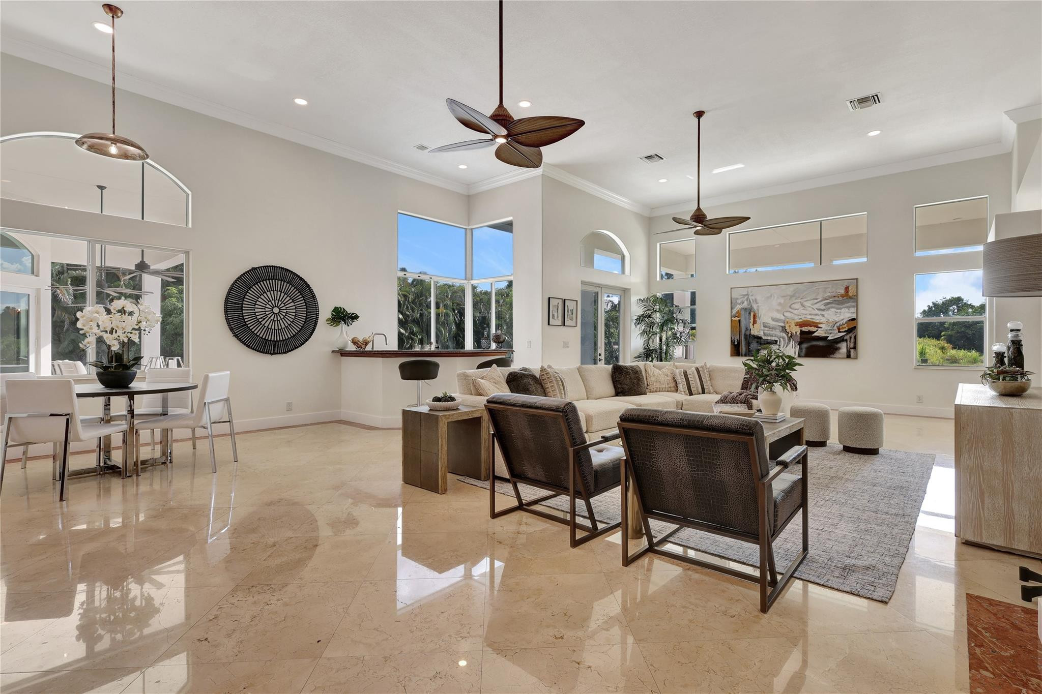 Undisclosed Address Southwest Ranches, FL 33332 - Photo 19 of 54 a living room with furniture a clock and a chandelier