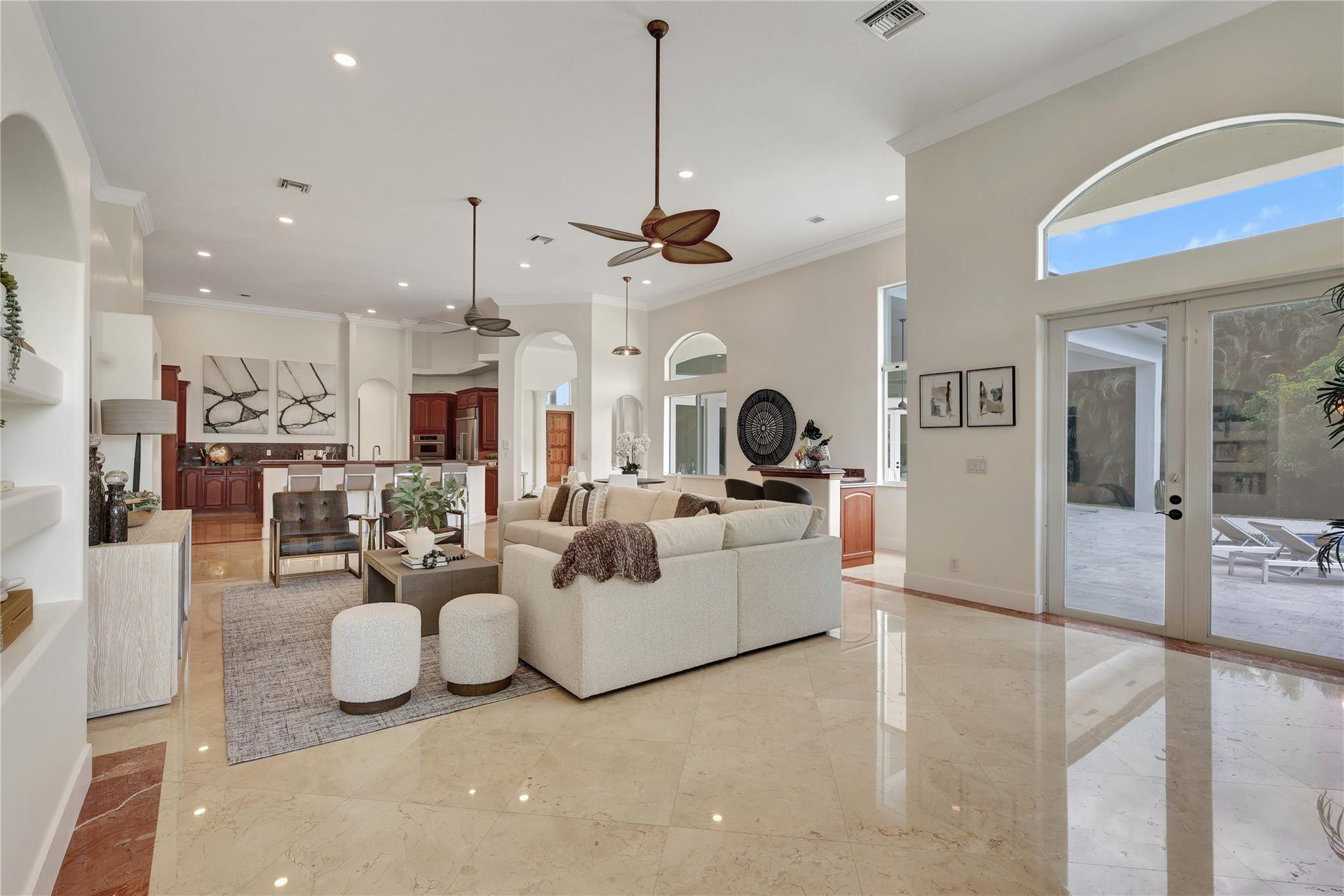 Undisclosed Address Southwest Ranches, FL 33332 - Photo 25 of 54 a living room with fireplace furniture and a chandelier