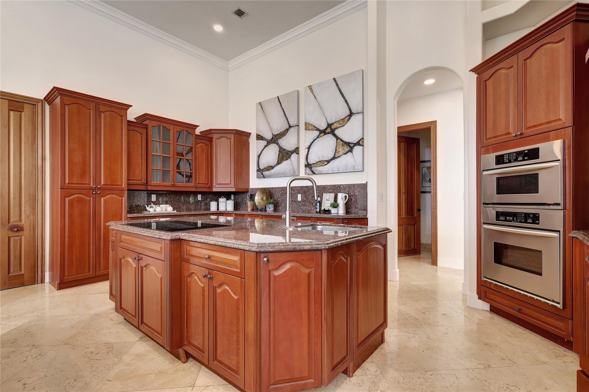 Undisclosed Address Southwest Ranches, FL 33332 - Photo 31 of 54 a kitchen with stainless steel appliances granite countertop a stove and a refrigerator