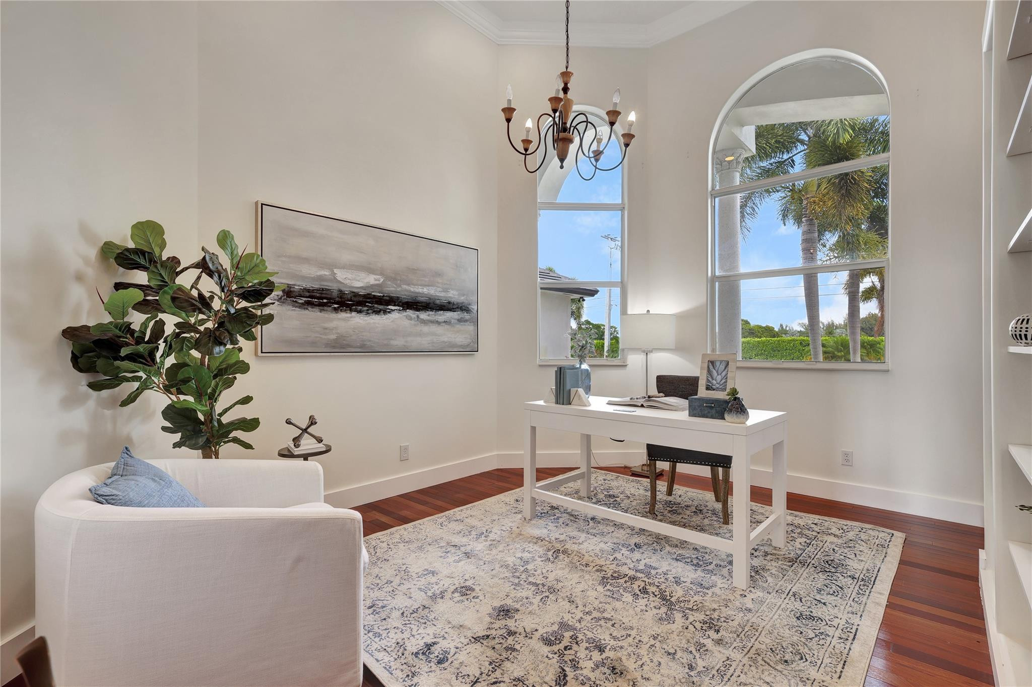 Undisclosed Address Southwest Ranches, FL 33332 - Photo 35 of 54 a living room with furniture and a potted plant