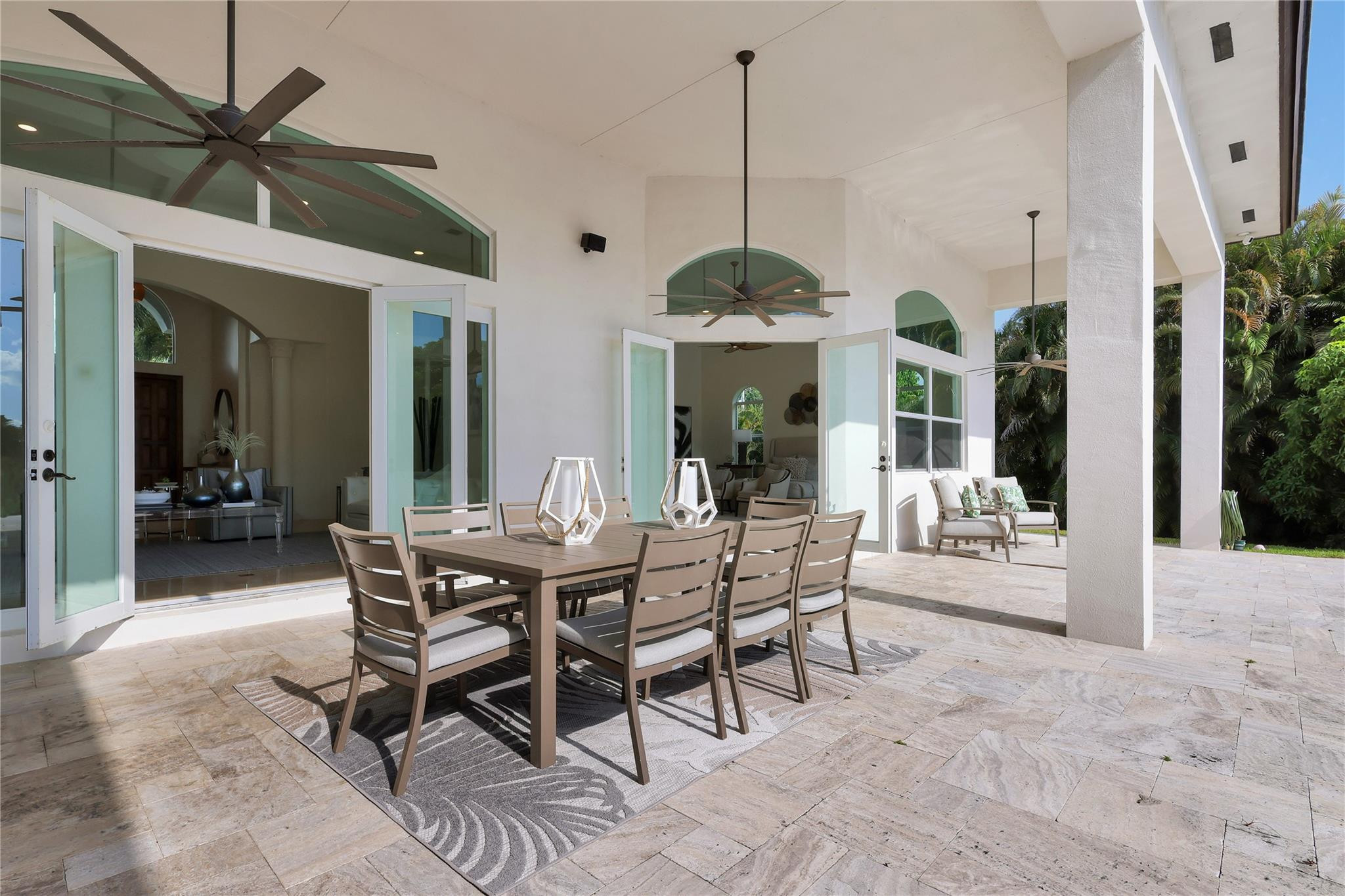 Undisclosed Address Southwest Ranches, FL 33332 - Photo 45 of 54 a view of a dining room and livingroom with furniture wooden floor a chandelier