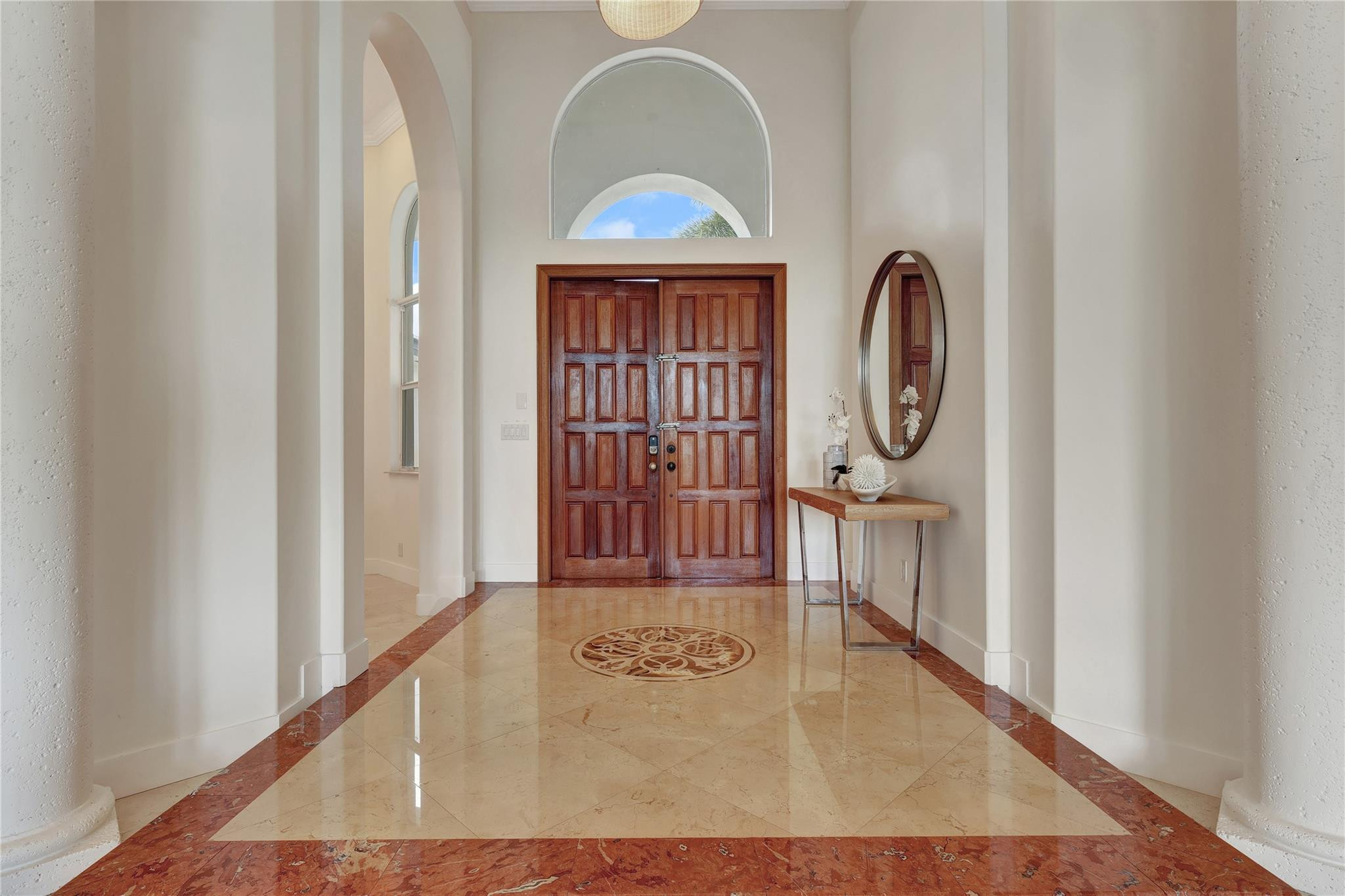 Undisclosed Address Southwest Ranches, FL 33332 - Photo 9 of 54 a view of a hallway with entryway wooden floor and front door