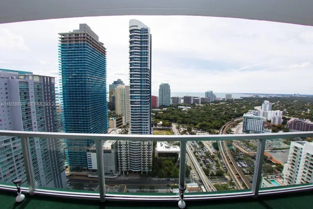 a view of a balcony with city view