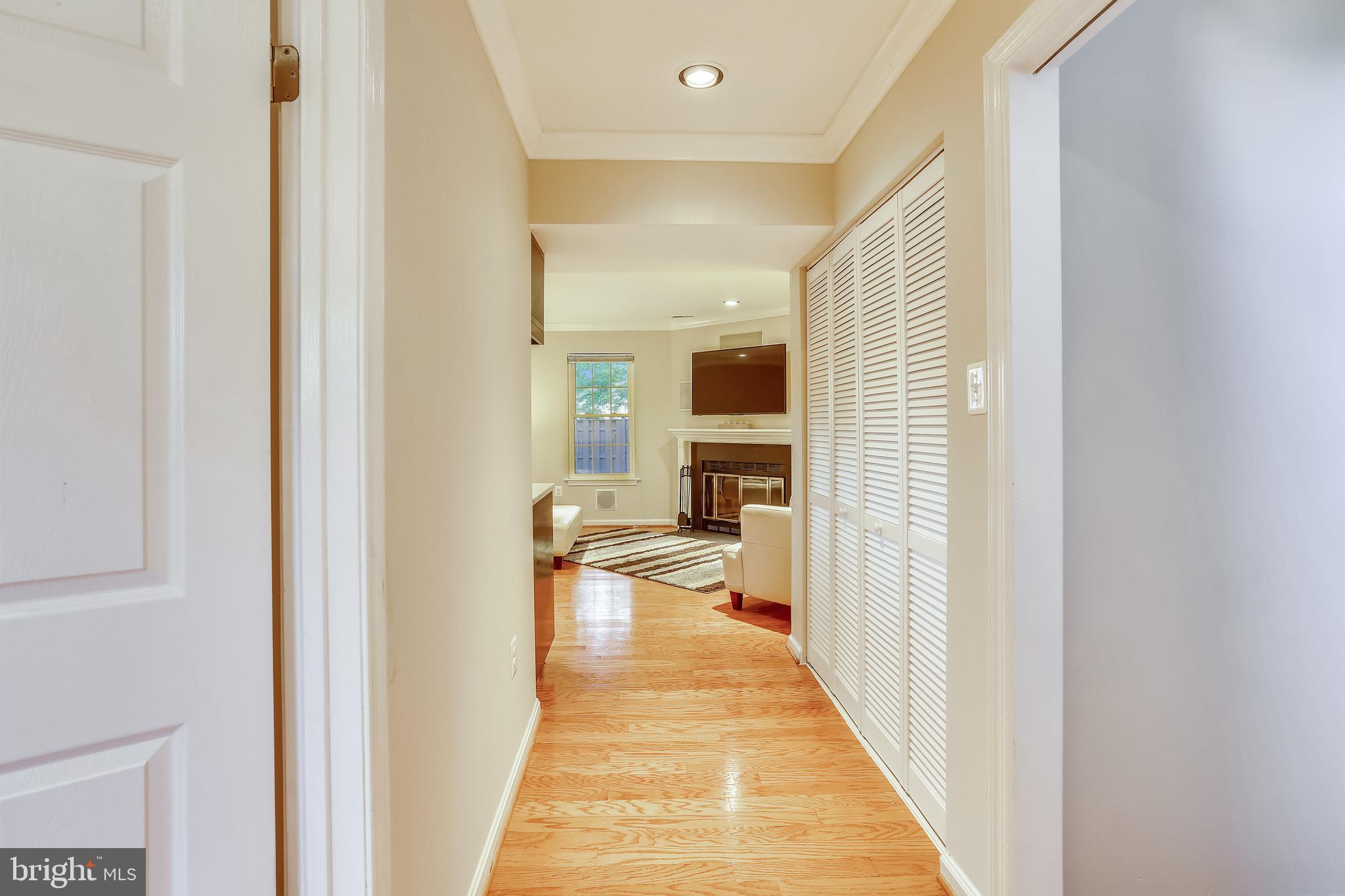 1907 Brightleaf Court Silver Spring, MD 20902 - Photo 24 of 28 HALLWAY TO LOWER LEVEL FAMILY ROOM