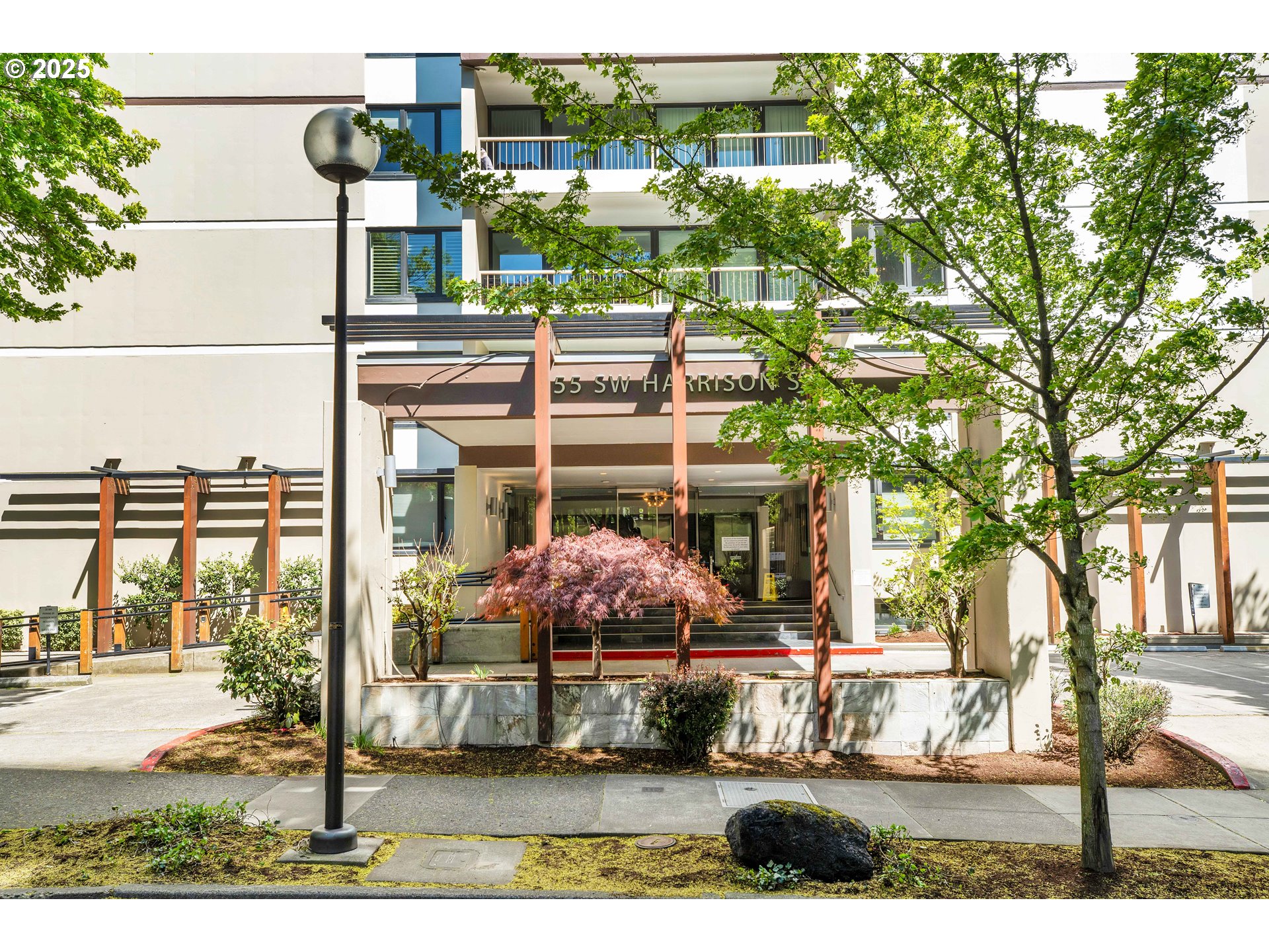255 Southwest Harrison Street, Unit 17F Portland, OR 97201 - Photo 23 of 31 a front view of a building with street view
