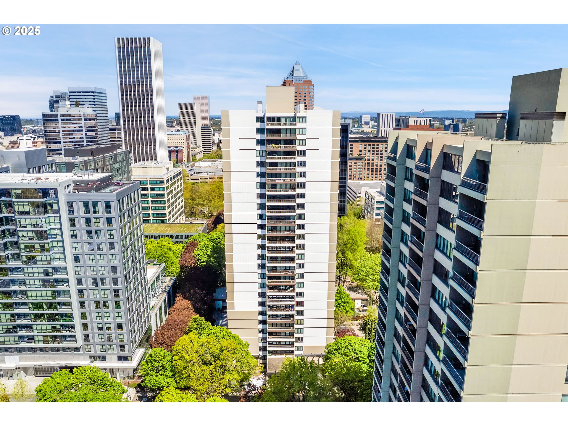 255 Southwest Harrison Street, Unit 17F Portland, OR 97201 - Photo 27 of 31 a view of a city with tall buildings