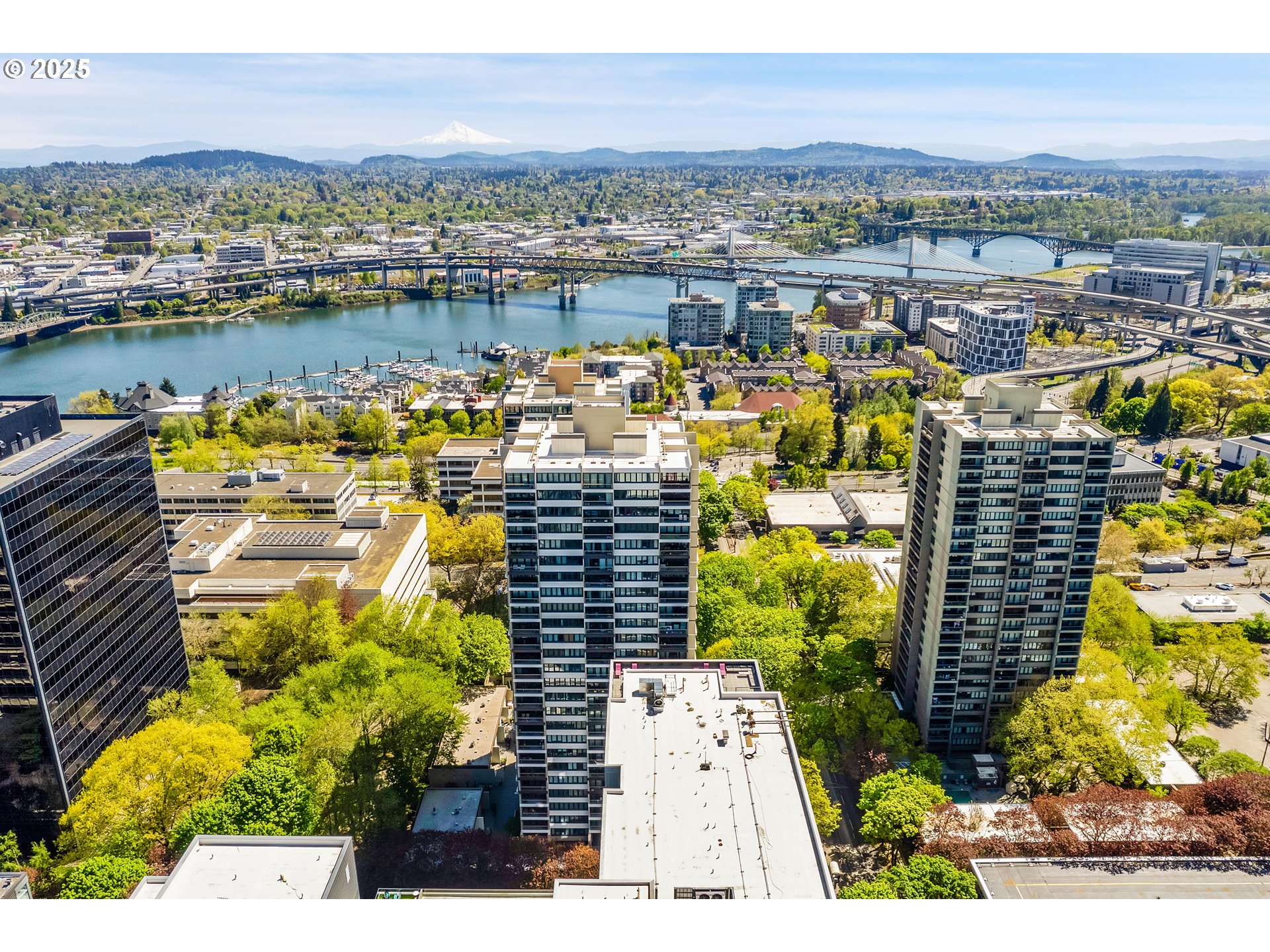 255 Southwest Harrison Street, Unit 17F Portland, OR 97201 - Photo 28 of 31 a view of a city with tall buildings