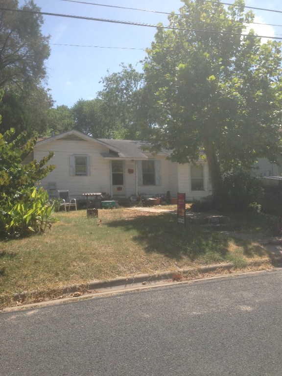 2001 Pequeno Street Austin, TX 78757 - Photo 1 of 1 a view of a house with a yard