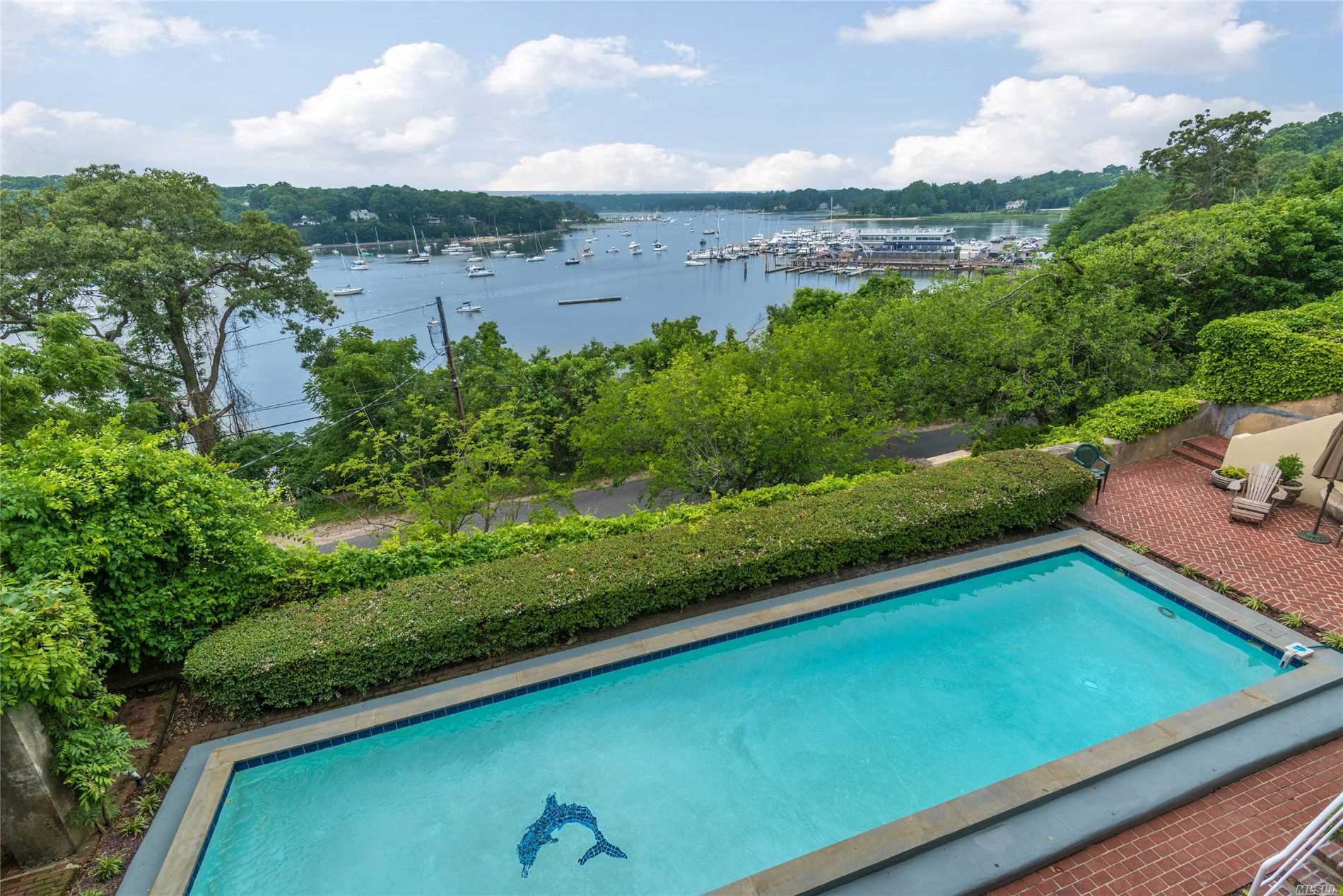 a view of a yard with an outdoor seating yard
