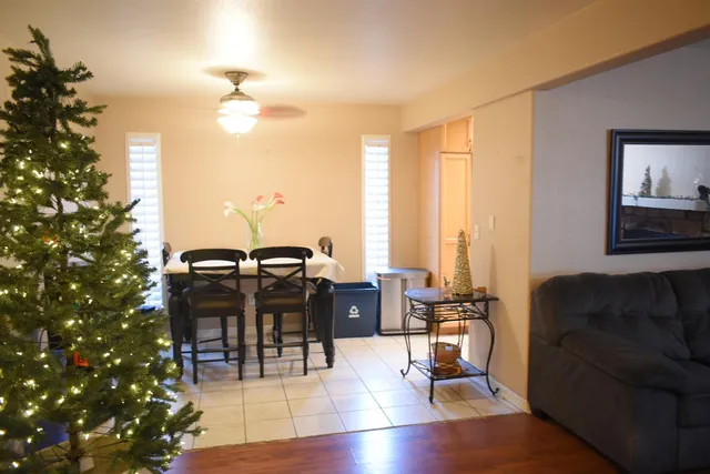 a view of a livingroom with furniture and window