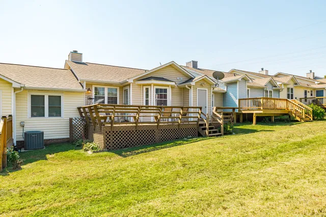 a view of a livingroom with a furniture and closet