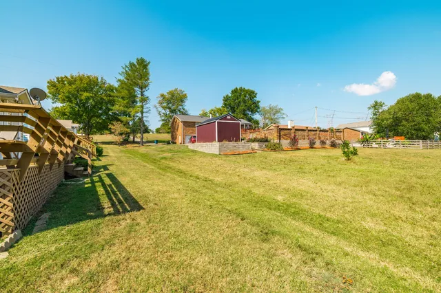 a workspace with furniture and a flat screen tv