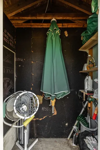 a kitchen with a stove a sink and a refrigerator