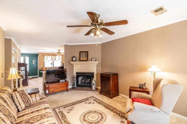 a kitchen with stainless steel appliances granite countertop a stove and a microwave