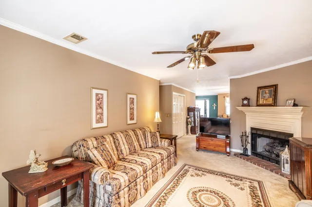 a kitchen with a sink and wooden cabinets