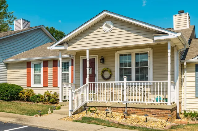 a view of a house with a large window