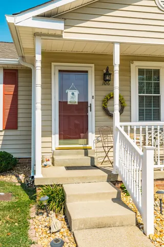 a view of a chairs and table on the wooden floor