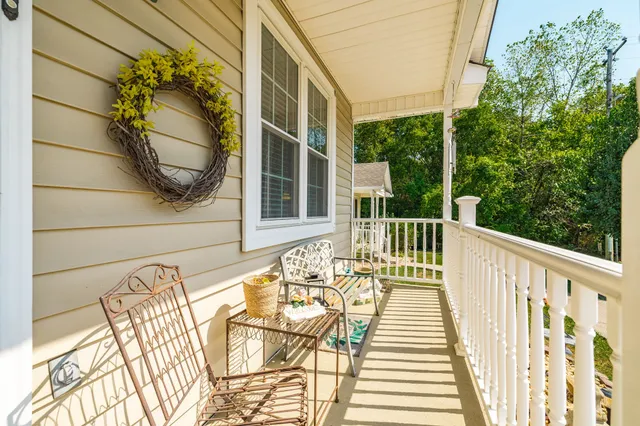 a view of swimming pool with seating area