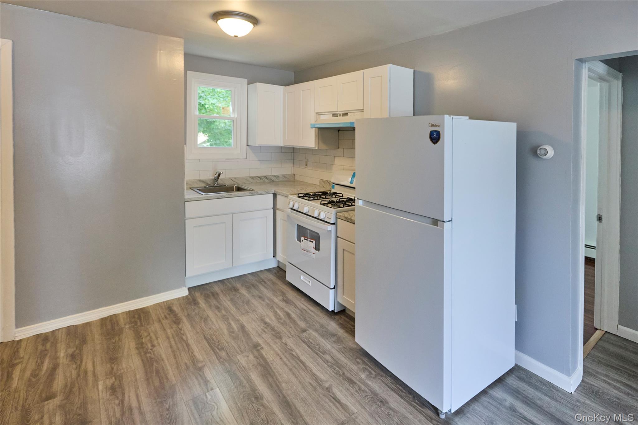 208 North James Street Peekskill, NY 10566 - Photo 3 of 13 Kitchen with new appliances (Unit 1)