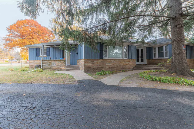 a view of a yard in front of a house
