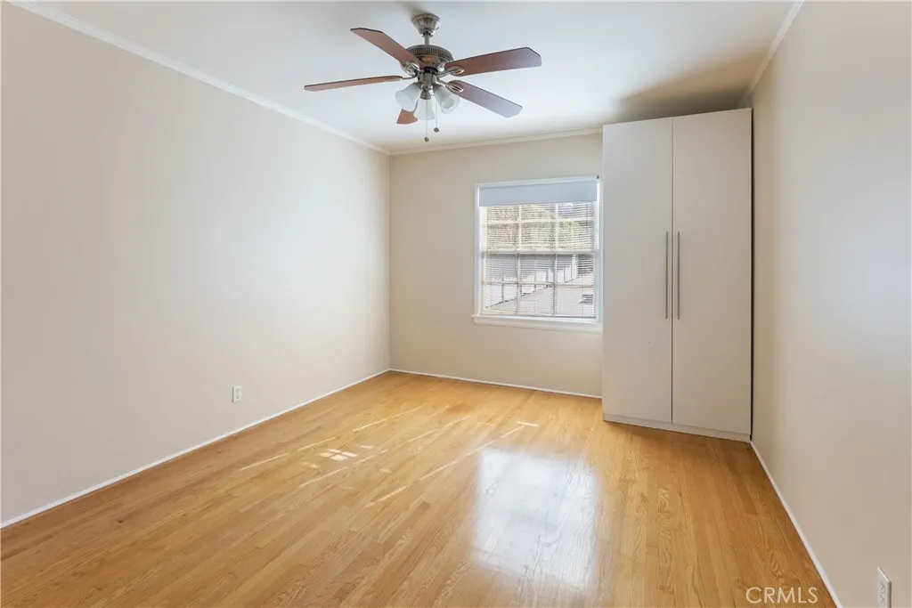 15207 Greenleaf Street Sherman Oaks, CA 91403 - Photo 26 of 32 an empty room with windows and fan