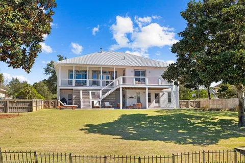 a view of a house with a swimming pool