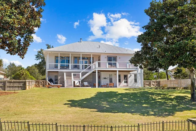 a view of a house with a swimming pool
