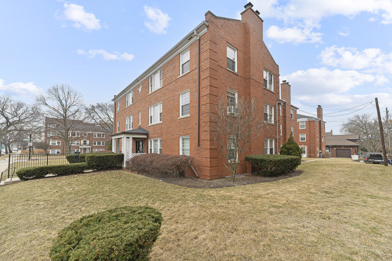 132 Ridge Avenue, Unit 2 Evanston, IL 60202 - Photo 14 of 14 a tall building with a large parking space