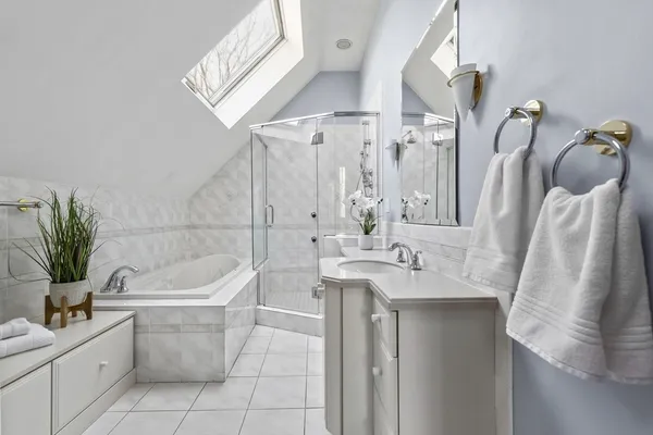 a bathroom with a sink a toilet and tub
