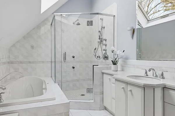 a bathroom with a sink and a bathtub