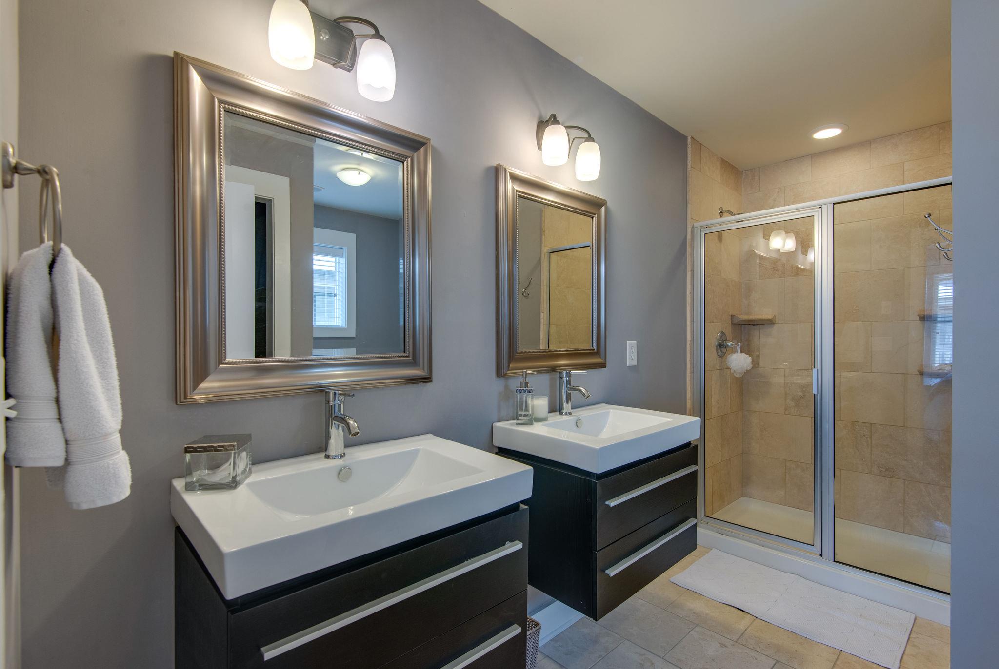 205 Copley Lane Nashville, TN 37204 - Photo 15 of 20 a bathroom with a sink double vanity and a mirror